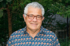Jeffrey Toobin proudly displays his newest book, Pardon In Westhampton Beach, New York